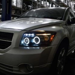 07-12 Dodge Caliber Angel Eye Halo & LED DRL Projector Headlights - Black -Professional Auto Parts Store 07 12 dodge caliber angel eye halo led drl projector headlights black 228